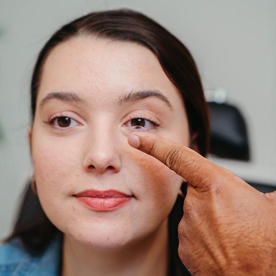 woman fitting transition contact lens at True Eye Experts